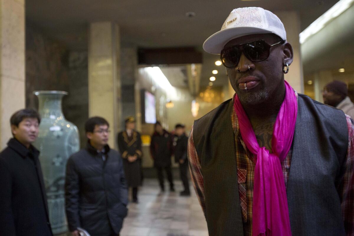 Former NBA star Dennis Rodman arrives at a hotel in Pyongyang, North Korea, on Monday. Rodman arrived in the North Korean capital with a squad of former NBA players in what he calls "basketball diplomacy," although U.S. officials have criticized his efforts.