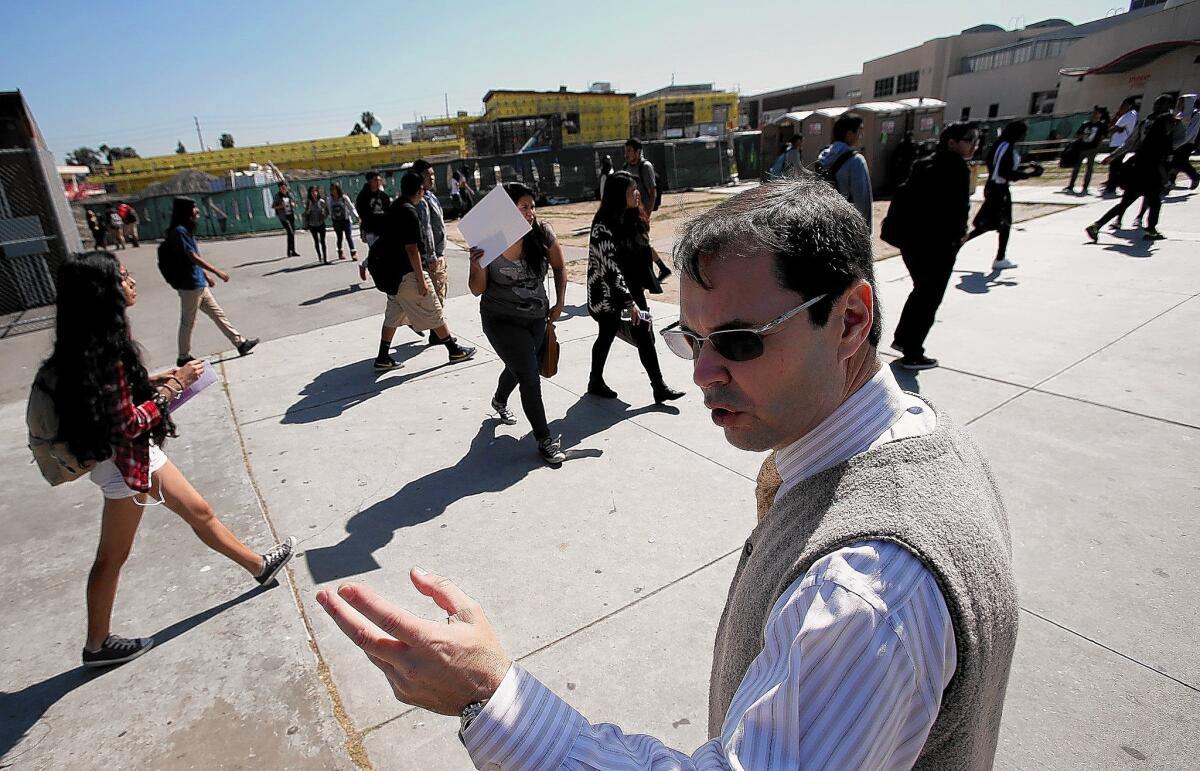 Jose Fernandez, the superintendent of the Centinela Valley Union High School District, said he received the generous contract because he agreed to take control of the school system at a risky time. Above, Fernandez at Hawthorne High last month.