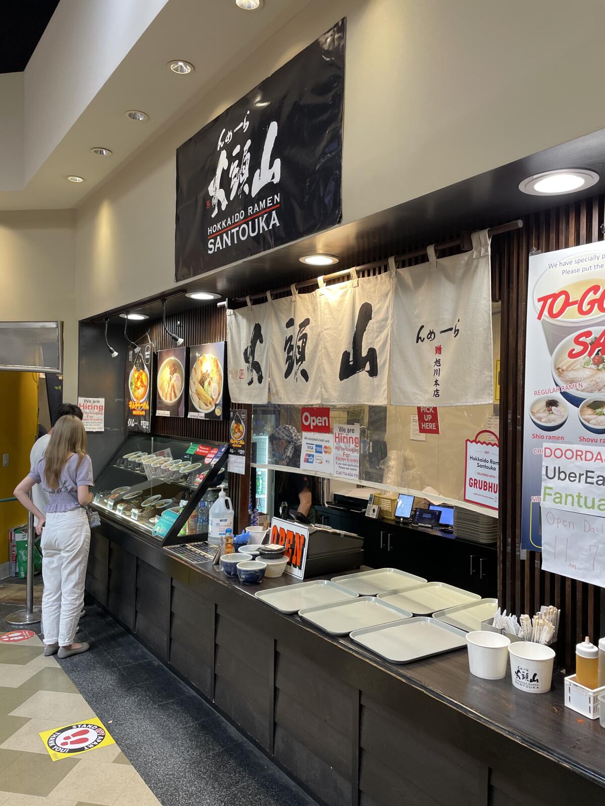 The food counter at Hokkaido Ramen Santouka on Paularino Avenue in Costa Mesa.