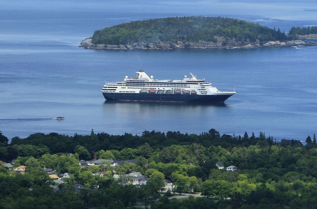 This 2010 file photo shows a cruise ship in Maine. Below, a San Diego doctor shares his story of boarding a cruise as the coronavirus pandemic broke out.