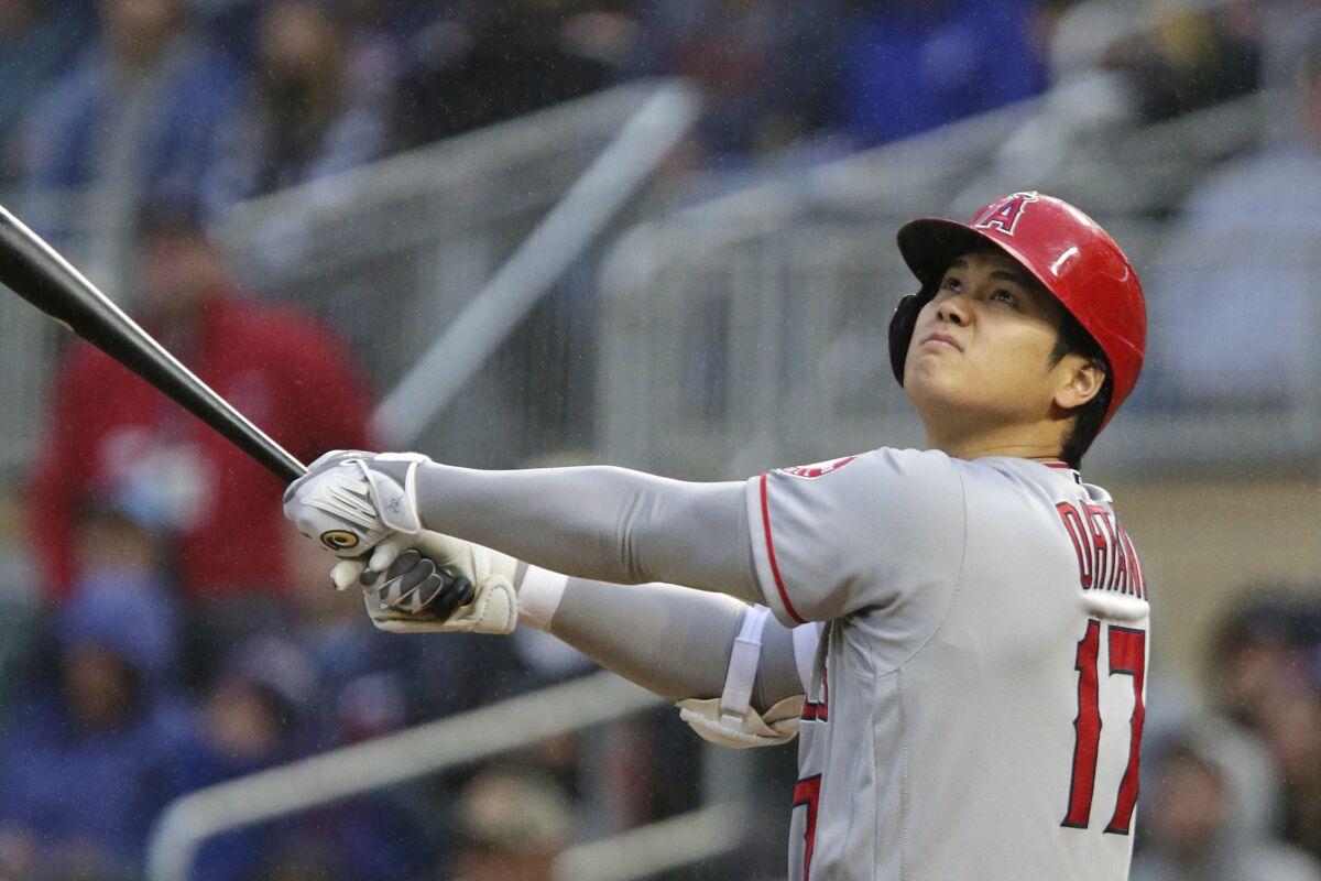 Los Angeles Angels Shohei Ohtani flies out during the first inning of the team's baseball game against the Minnesota Twins on Saturday, Sept. 24, 2022, in Minneapolis. (AP Photo/Andy Clayton-King)