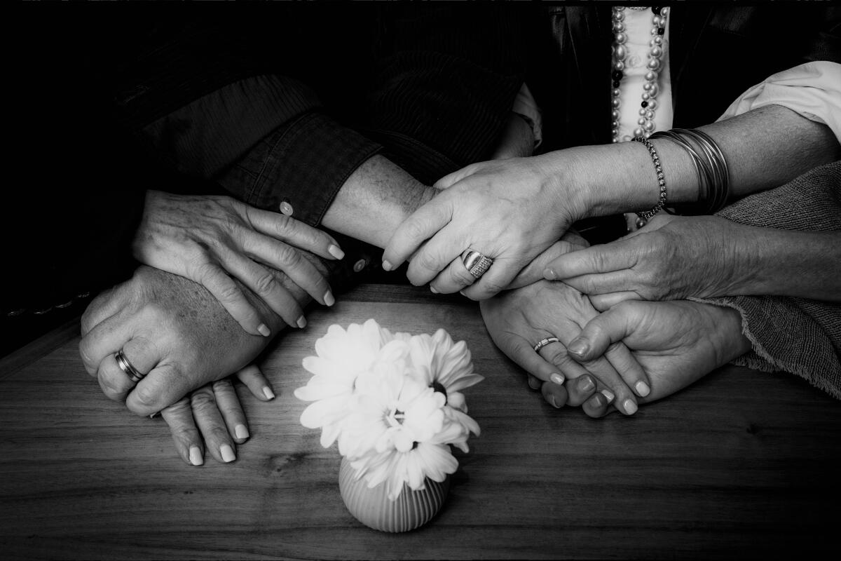 The hands of Steven Spielberg and siblings.