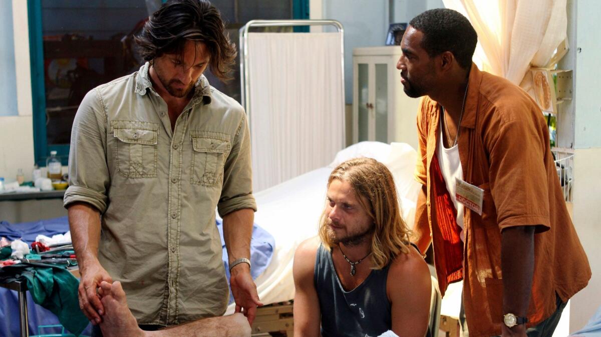 Martin Henderson, left, with Thomas Blake Jr. and Jason George in a scene from "Off the Map. (Mario Perez/ABC)