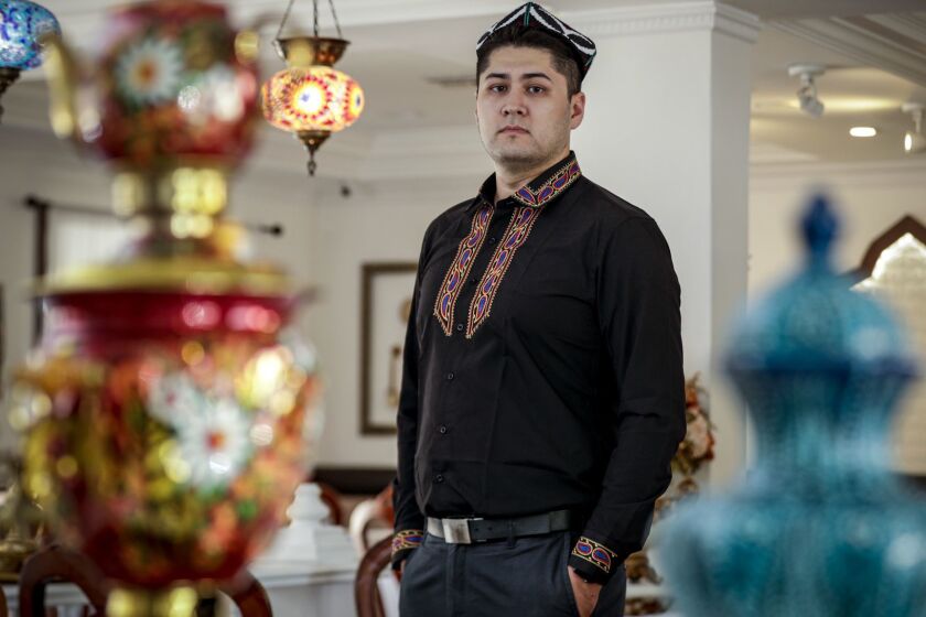 ALHAMBRA, CA - MAY 29, 2019 ? Bughra Arkin's father was taken by police last October. The 28-year-old believes his father was placed in a re-education camp. Arkin, who owns Dolan's Uyghur Cuisine, said he is "devastated" by the situation in Xinjiang and worries for the rest of his family. The United Nations Committee on the Elimination of Racial Discrimination has estimated that about 1 million Muslims ? mostly ethnic Uighurs but also other minorities ? in the Xinjiang region were being ?held incommunicado ? without being charged or tried, under the pretext of countering terrorism and religious extremism.? (Irfan Khan / Los Angeles Times)