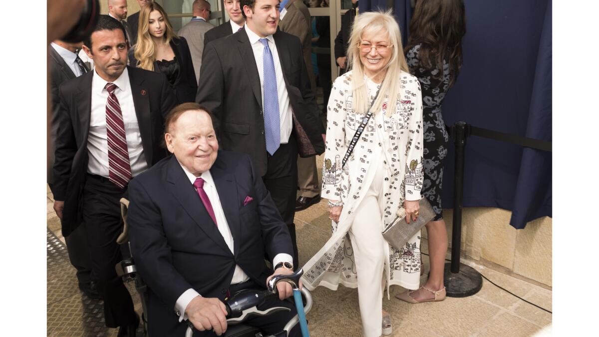 Sheldon Adelson and his wife, Miriam, arrive for the May opening of the U.S. Embassy in Jerusalem.