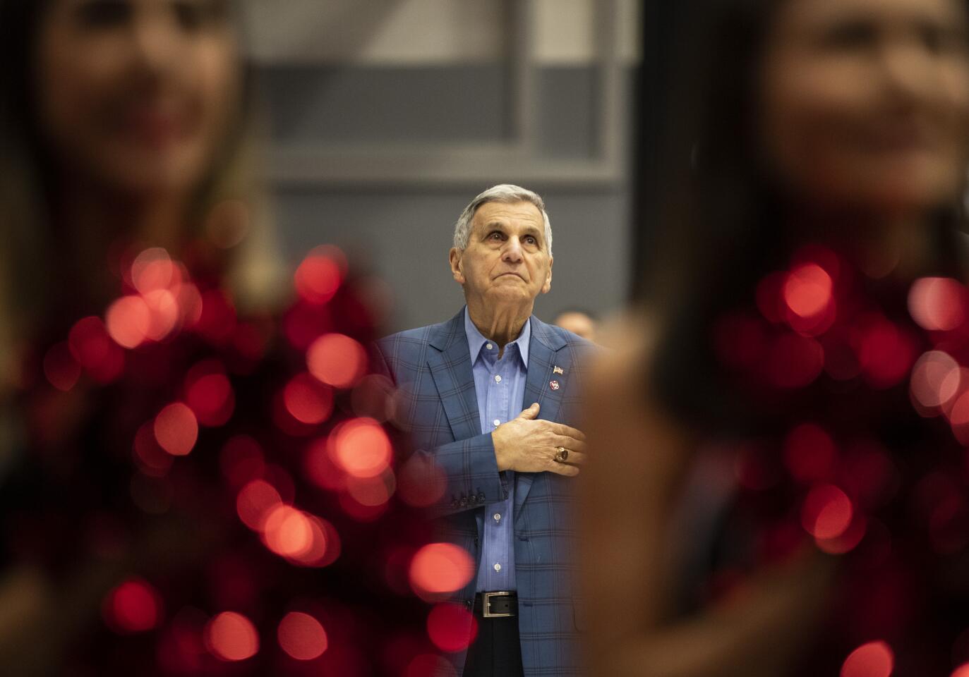 Cal State Northridge assistant men’s basketball coach Jim Harrick stands for the national anthem prior to a game against Long Beach State on Jan. 8 at the Matadome.