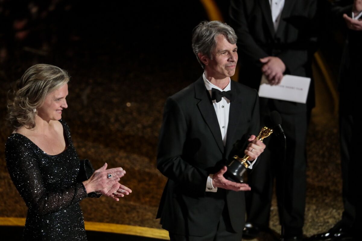 Elizabeth Martin and Marshall Curry accept the Oscar for “The Neighbors' Window."
