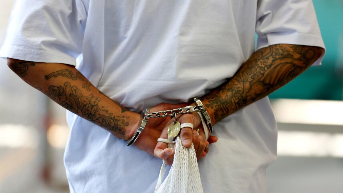 A death row inmate makes his way to his East Block cell after spending time in the yard at San Quentin State Prison in Northern California in 2016.