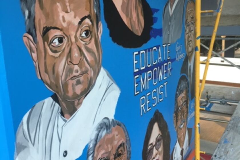 Community members honored on a new mural at Chicano Park unveiled