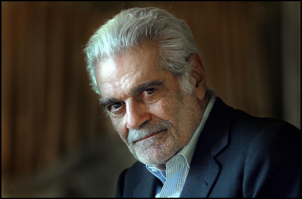 Actor Omar Sharif sits for a portrait at London's Atheneum hotel on Oct. 9, 2003.