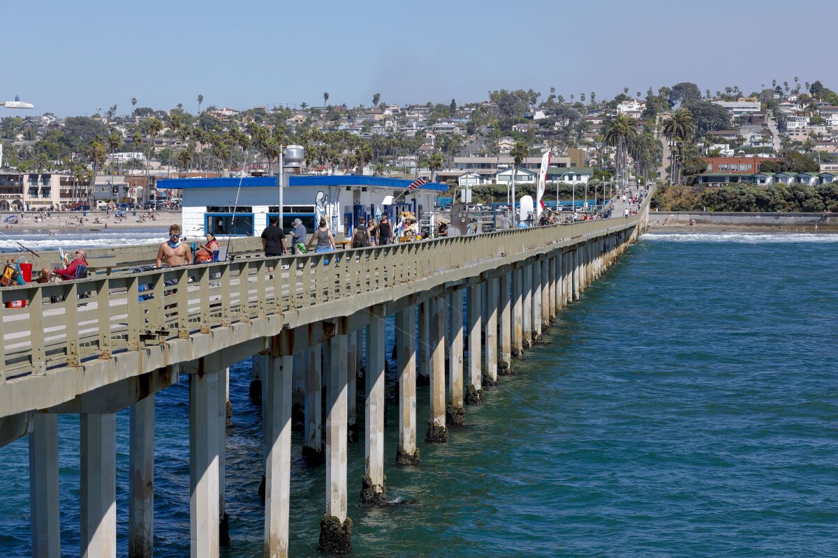 The Ocean Beach Pier, pictured in June 2020, is a popular spot for anglers to cast a line.