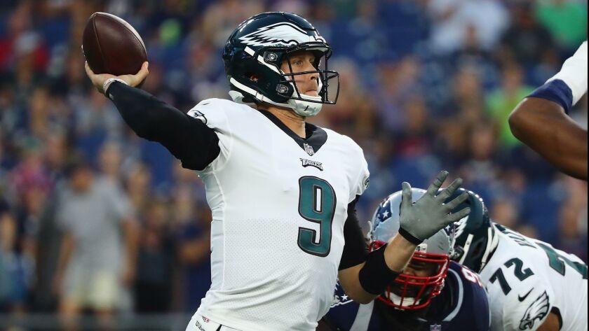 Eagles quarterback Nick Foles throws a pass in the first half against the New England Patriots during Thursday's preseason game.