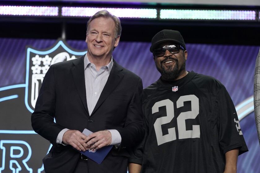 FILE - Rapper Ice Cube, right, poses with NFL Commissioner Roger Goodell during the first round of the NFL football draft Thursday, April 28, 2022, in Las Vegas. The NFL is teaming up with Ice Cube. The league announced Thursday, June 30, 2022, a partnership with Contract with Black America Institute, an economic inclusion-focused initiative led by artist and entrepreneur O'Shea Jackson, who is known as Ice Cube.(AP Photo/John Locher, File)