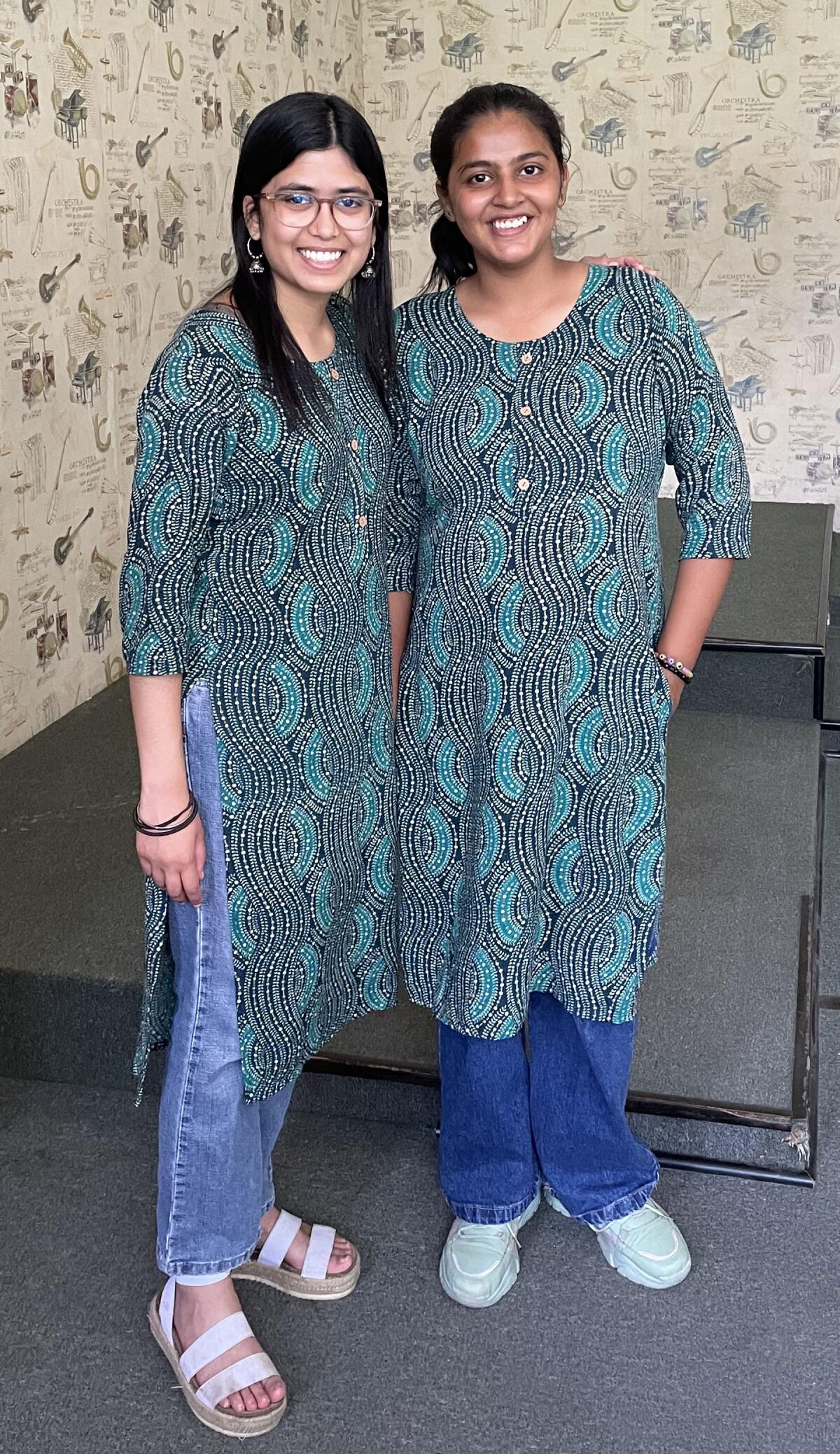 Exchange student Nirja Trivedi with host sister, Manya Saini. They bought matching dresses during a shopping trip in India.