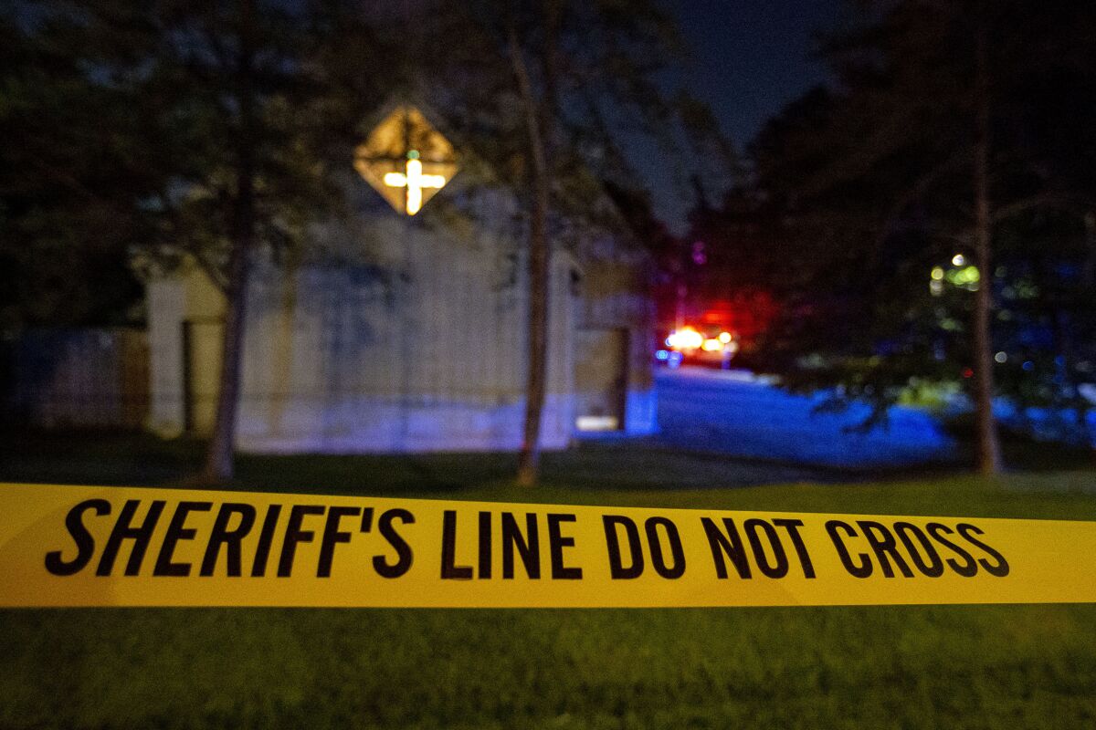 CORRECTS NAME OF CHURCH - Police barricade off the area after a shooting at the Saint Stephen’s Episcopal Church on Thursday, June 16, 2022 in Vestavia, Ala. (AP Photo/Butch Dill)