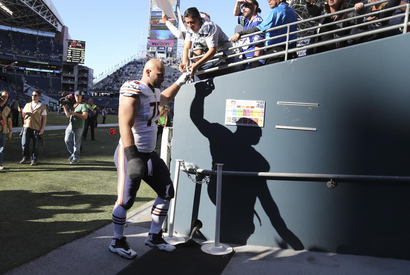 Kyle Long heads to the locker rooms following his team's 26-0 loss.