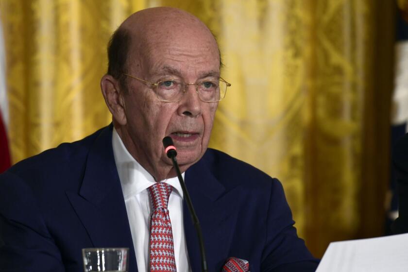 FILE - In this June 18, 2018, file photo, Commerce Secretary Wilbur Ross speaks at a National Space Council meeting in the East Room of the White House in Washington. Trumpâs cabinet offers its members broad opportunities to reshape the government and advance a conservative agenda. But that comes with everyday doses of presidential adulation, humiliation, perks and pestering. Sometimes all at roughly the same time. (AP Photo/Susan Walsh, File)