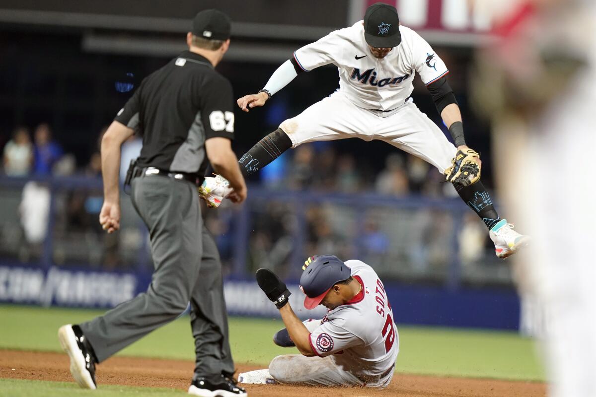 Garrett throws 6 solid innings as the Marlins beat the Nationals 5