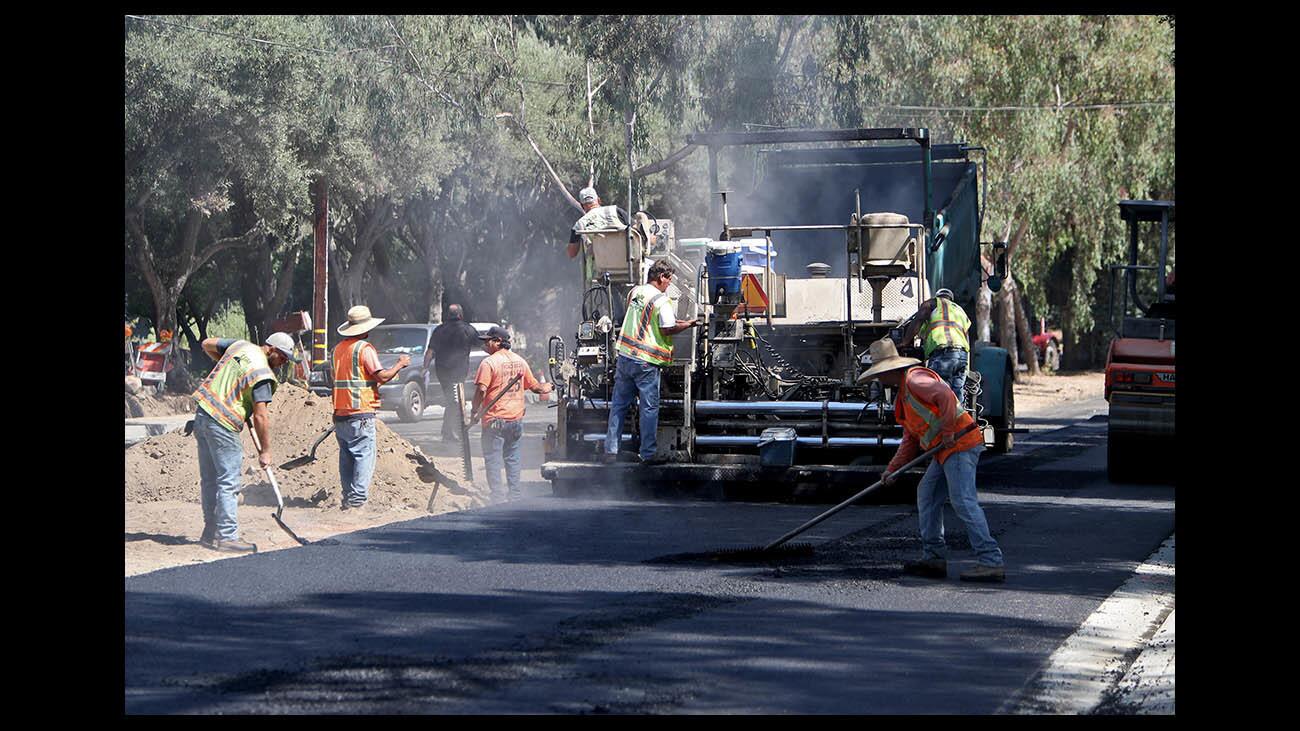 Photo Gallery: Paradise Canyon Elementary streets get new asphalt for new school year