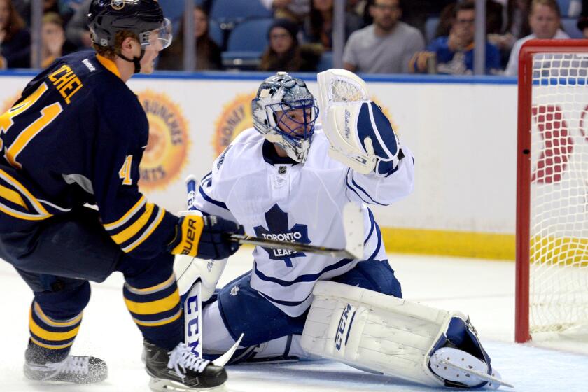 Rookie Jack Eichel (41), scoring against Maples Leafs goalie Jonathan Bernier on Sept. 29, gives the lowly Sabres some future firepower.