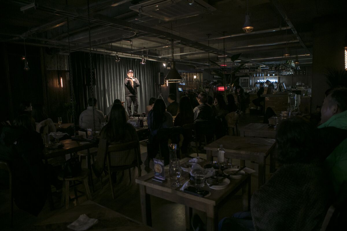 Danny Cho performs at a comedy show in downtown Seoul.