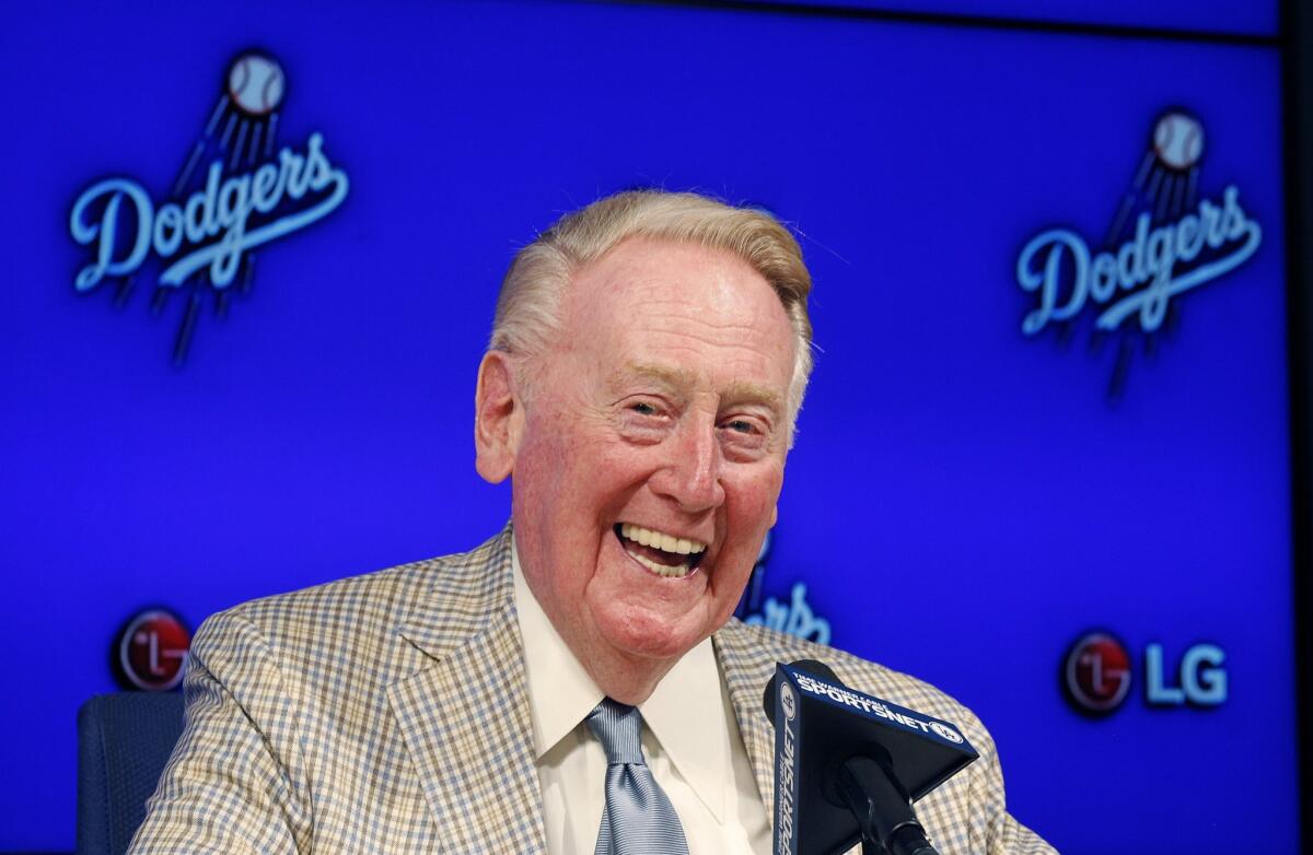 Vin Scully speaks at a news conference on Aug. 29.