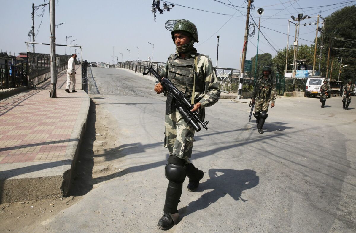 Indian paramilitary soldiers enforce a curfew in Srinagar, the summer capital of Indian Kashmir.