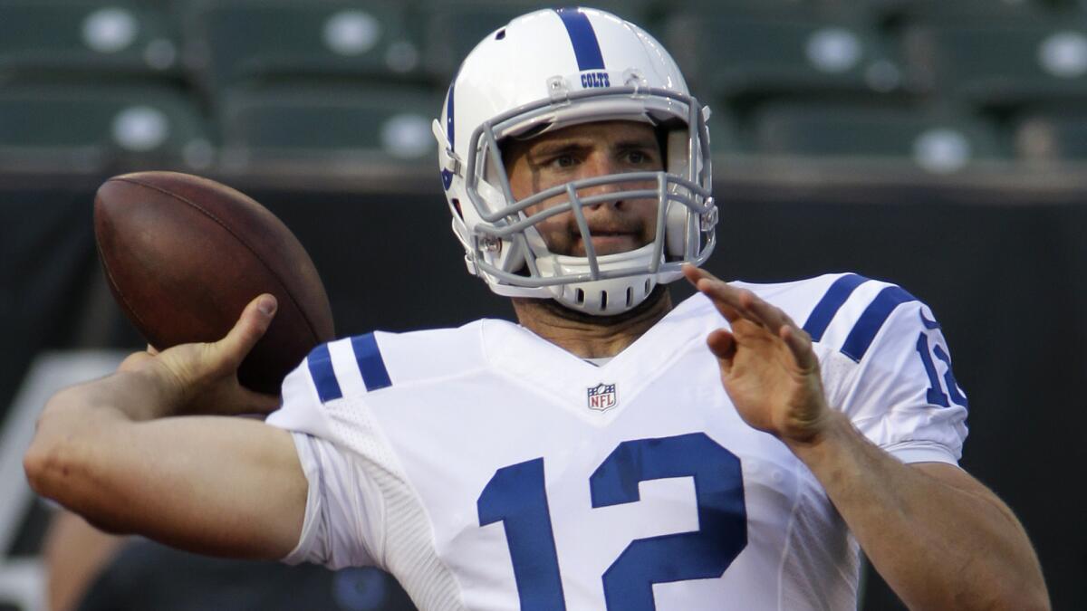 Indianapolis Colts quarterback Andrew Luck warms up before a preseason game against the Cincinnati Bengals on Aug. 28. Will Luck and the Colts improve on last season's 11-5 mark?