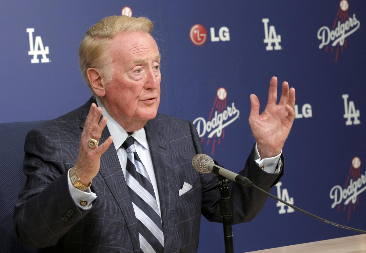 Dodgers broadcaster Vin Scully, shown at a news conference in February, recently nixed the idea of naming a street near Dodger Stadium after him.