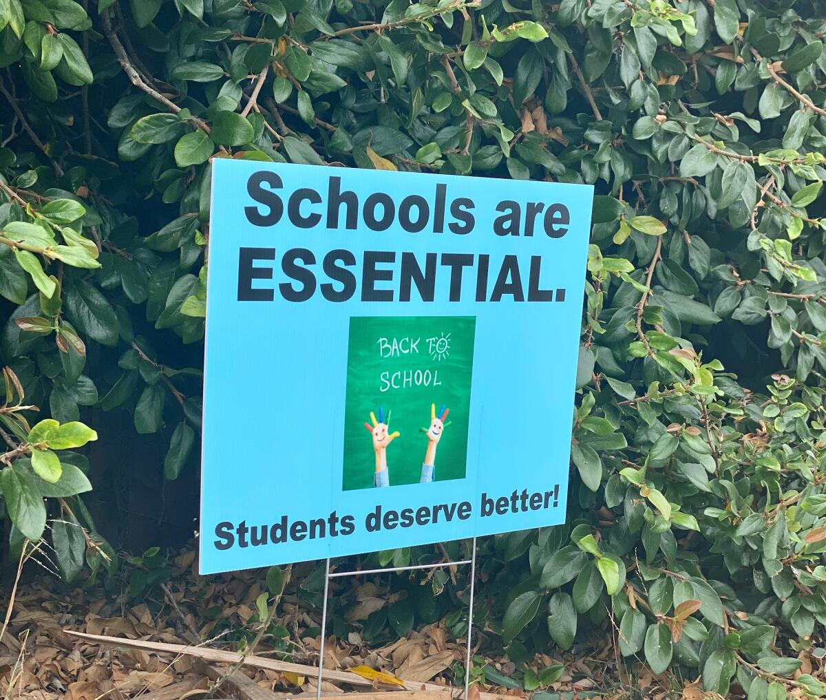 This is one of several signs seen posted Aug. 24 on the perimeter of La Jolla High School.