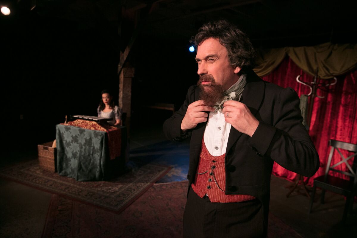 David Melville, right, portrays Charles Dickens in the Independent Shakespeare Company's staging.