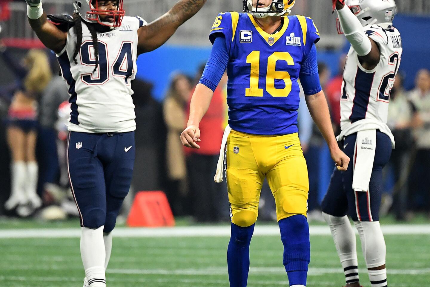 Los Angeles Rams running back Todd Gurley spits water as he sits