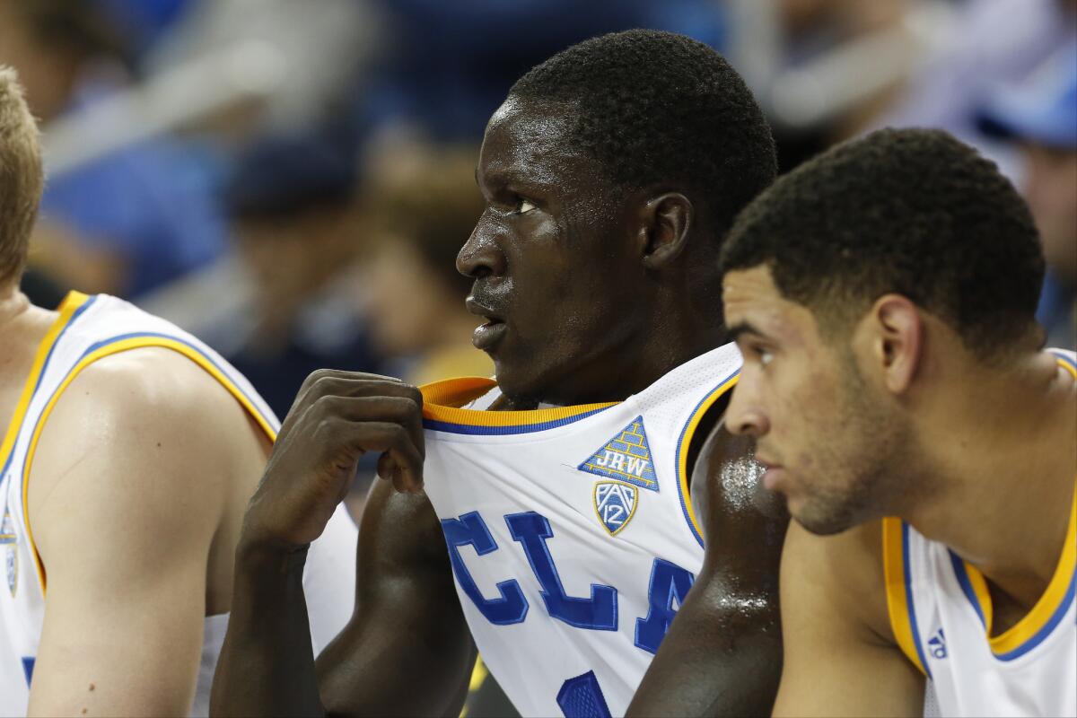 UCLA forward Wanaah Bail, center, watches the Bruins' game against Nicholls State on Nov. 20.