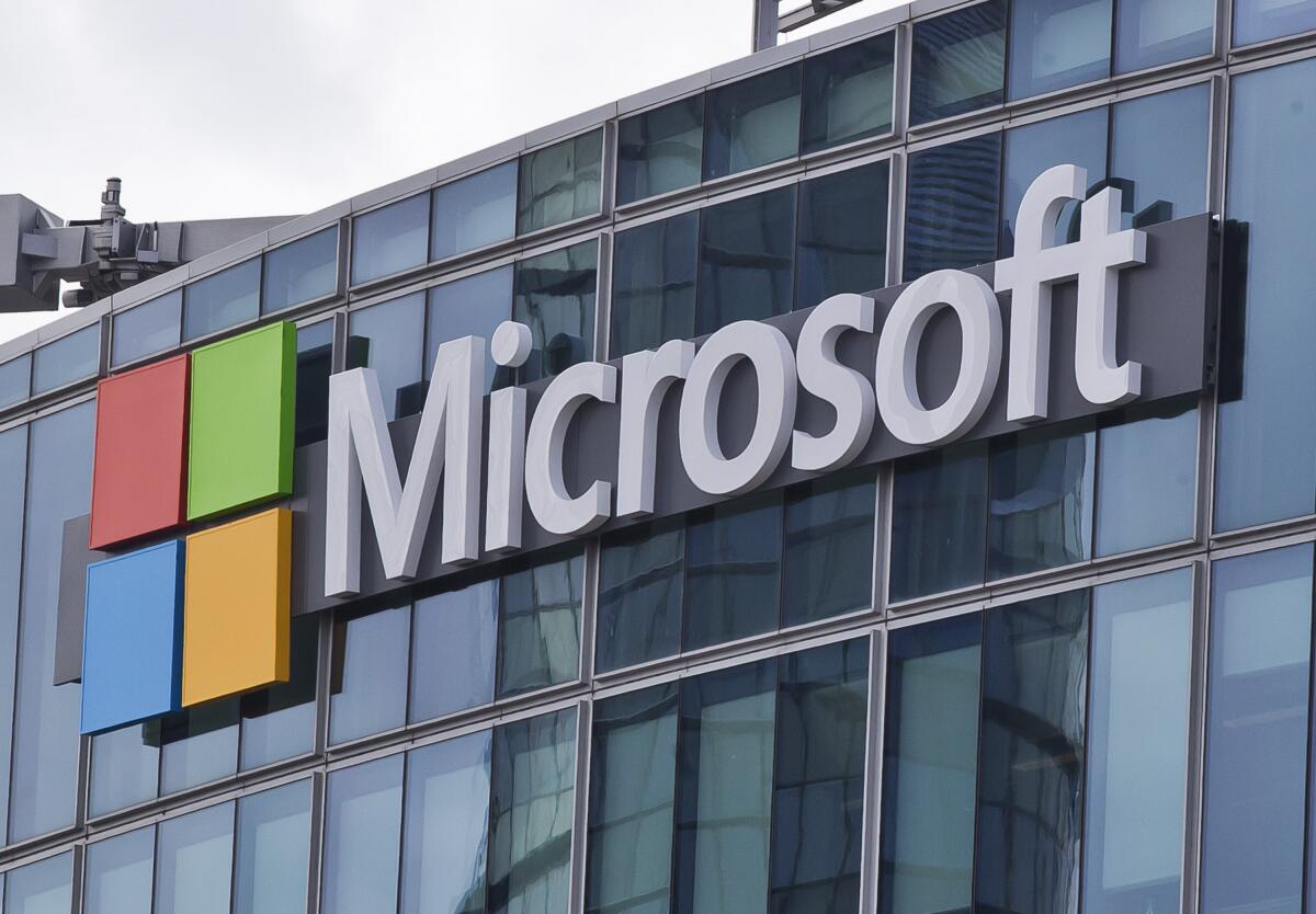 The Microsoft name and logo are on an office building in Issy-les-Moulineaux, France.