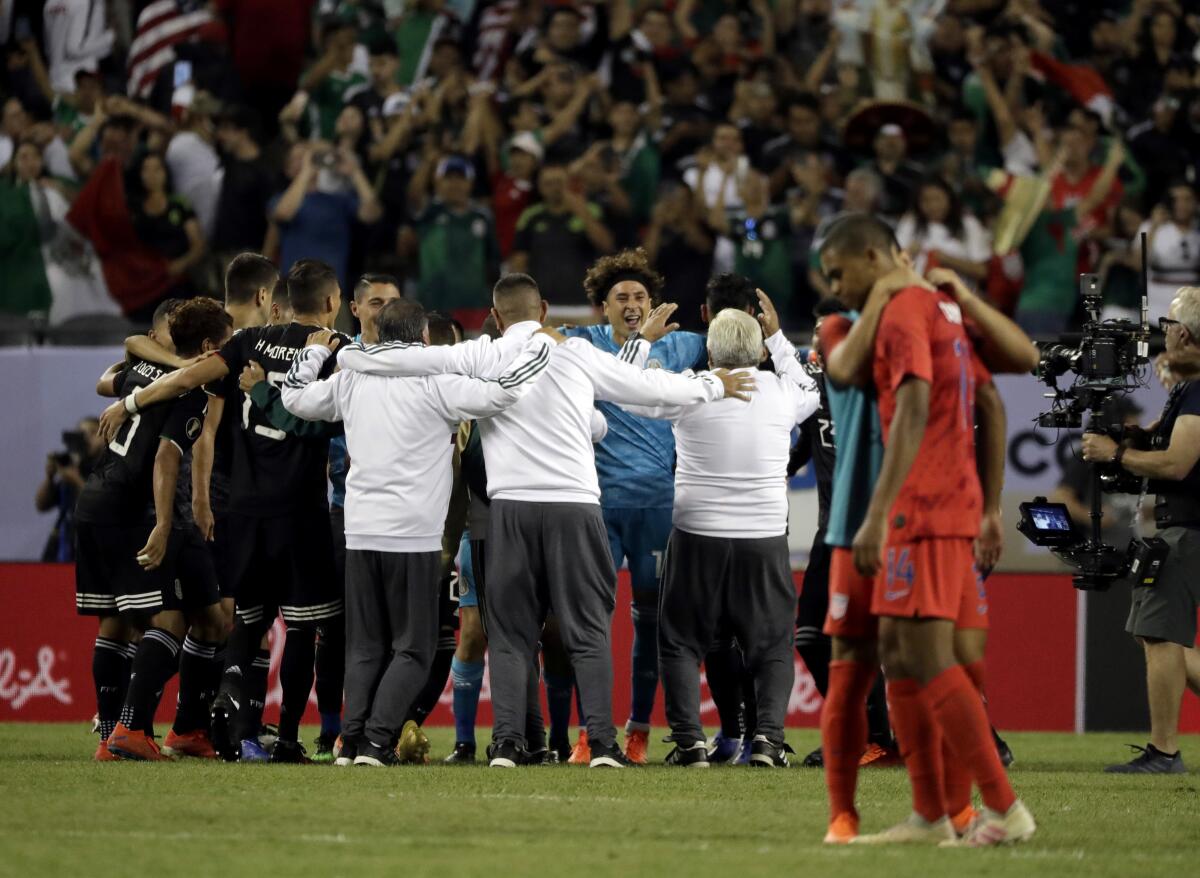 Players from the Mexican national team celebrate after a 1-0 win over the U.S. in the CONCACAF Gold Cup final July 7, 2019.