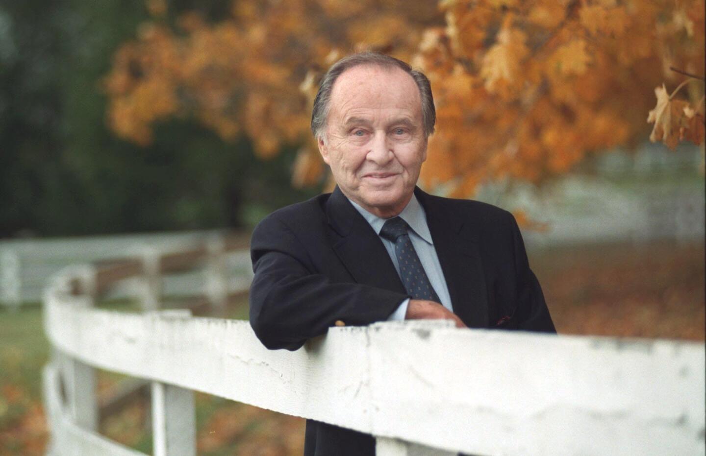 ABC sportscaster Jim McKay is celebrating his 50th. year in broadcasting and is writing a book about those years. The former Baltimore Sun reporter moved on to host ABC's "Wide World of Sports" for nearly four decades. The Loyola graduate ('43) died in 2008. Shown is Mckay at his farm in Monkton in 1997.