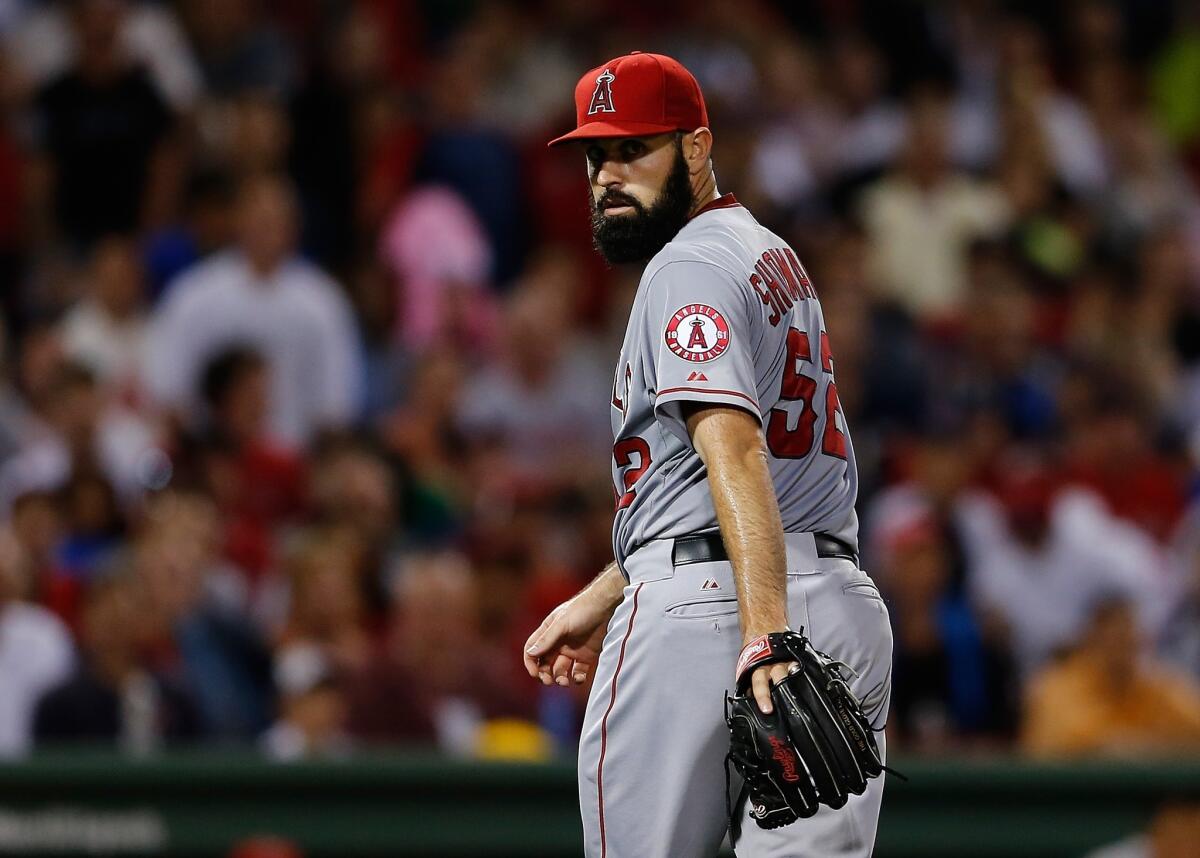 Angels pitcher Matt Shoemaker leaves the field after giving up one hit over 7 2/3 innings in a 2-0 victory Thursday over the Boston Red Sox at Fenway Park.