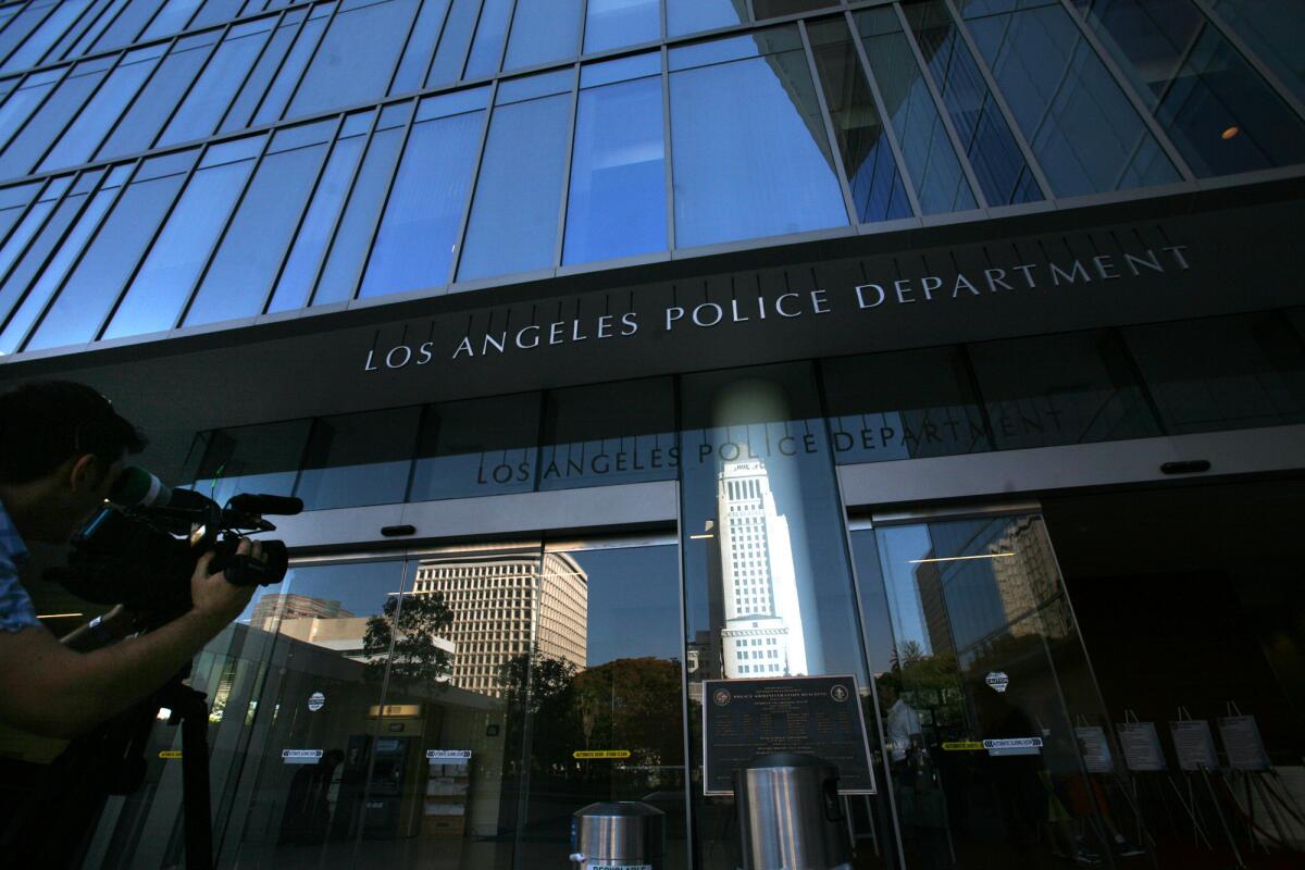 Two videographers were arrested for failing to disperse from a protest in downtown L.A. Wednesday night.