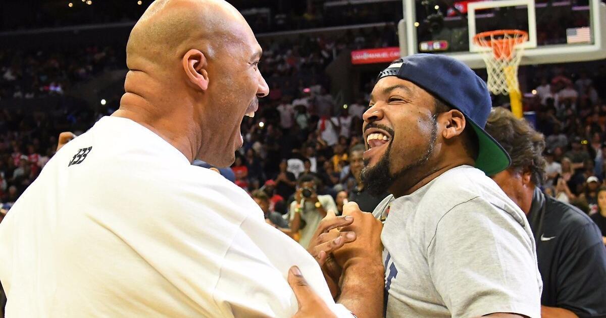 Rapper/actor Ice Cube performs at halftime of a game between the