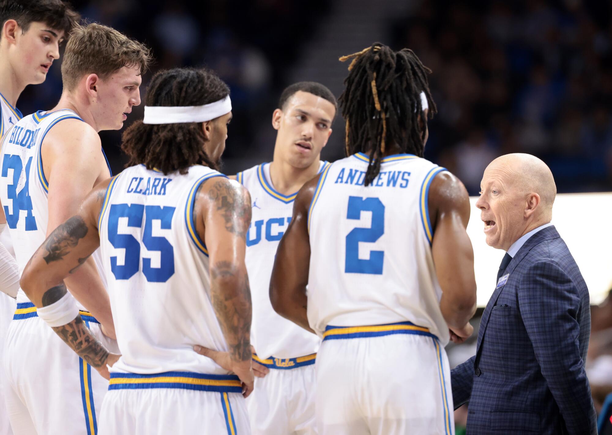 How UCLA's Andy Hill spawned the plus-minus stat, an ode to group play and John Picket 1 UCLA' coach Mick Cronin talks to his players huddled around him during a timeout.