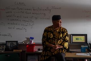 LOS ANGELES, CA - APRIL 13: Dr. Donald Singleton, Esq., NBCT, who teaches AP African American Studies at Susan Miller Dorsey Senior High School on Thursday, April 13, 2023 in Los Angeles, CA. (Irfan Khan / Los Angeles Times)