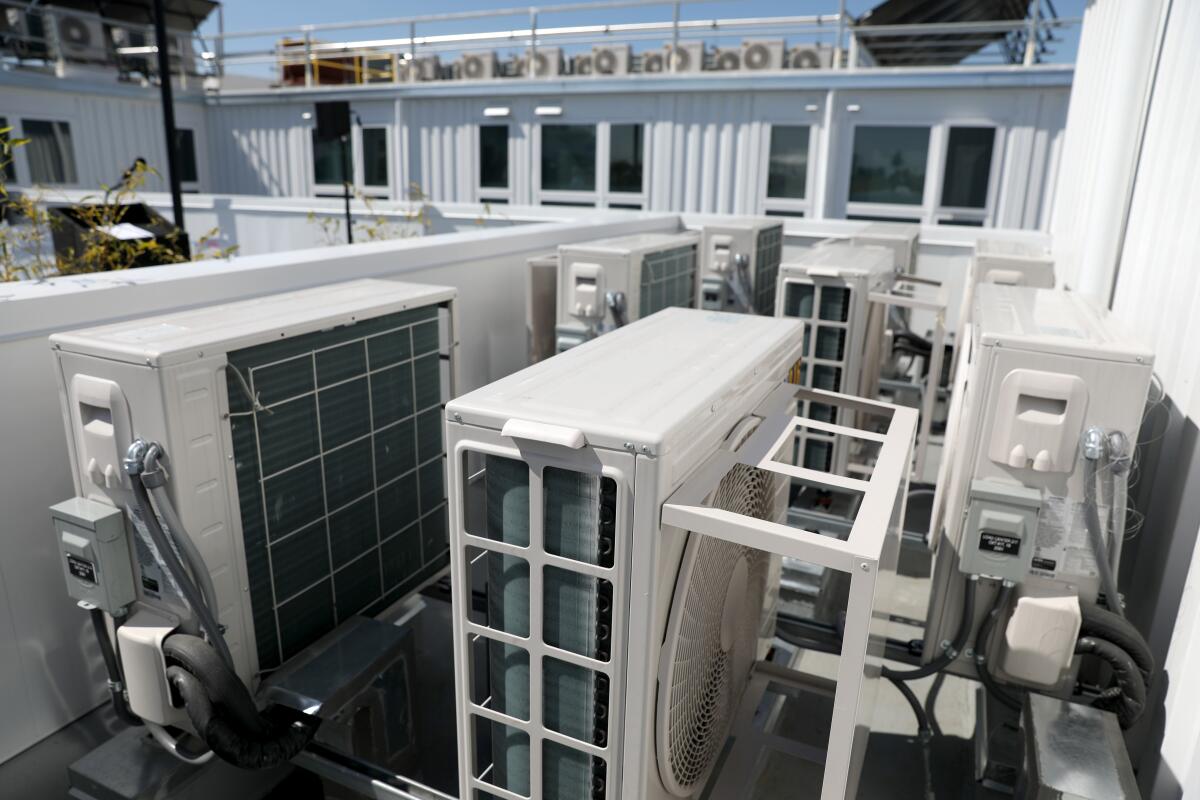 Air conditioning units are seen on a rooftop in downtown Los Angeles on March 9.