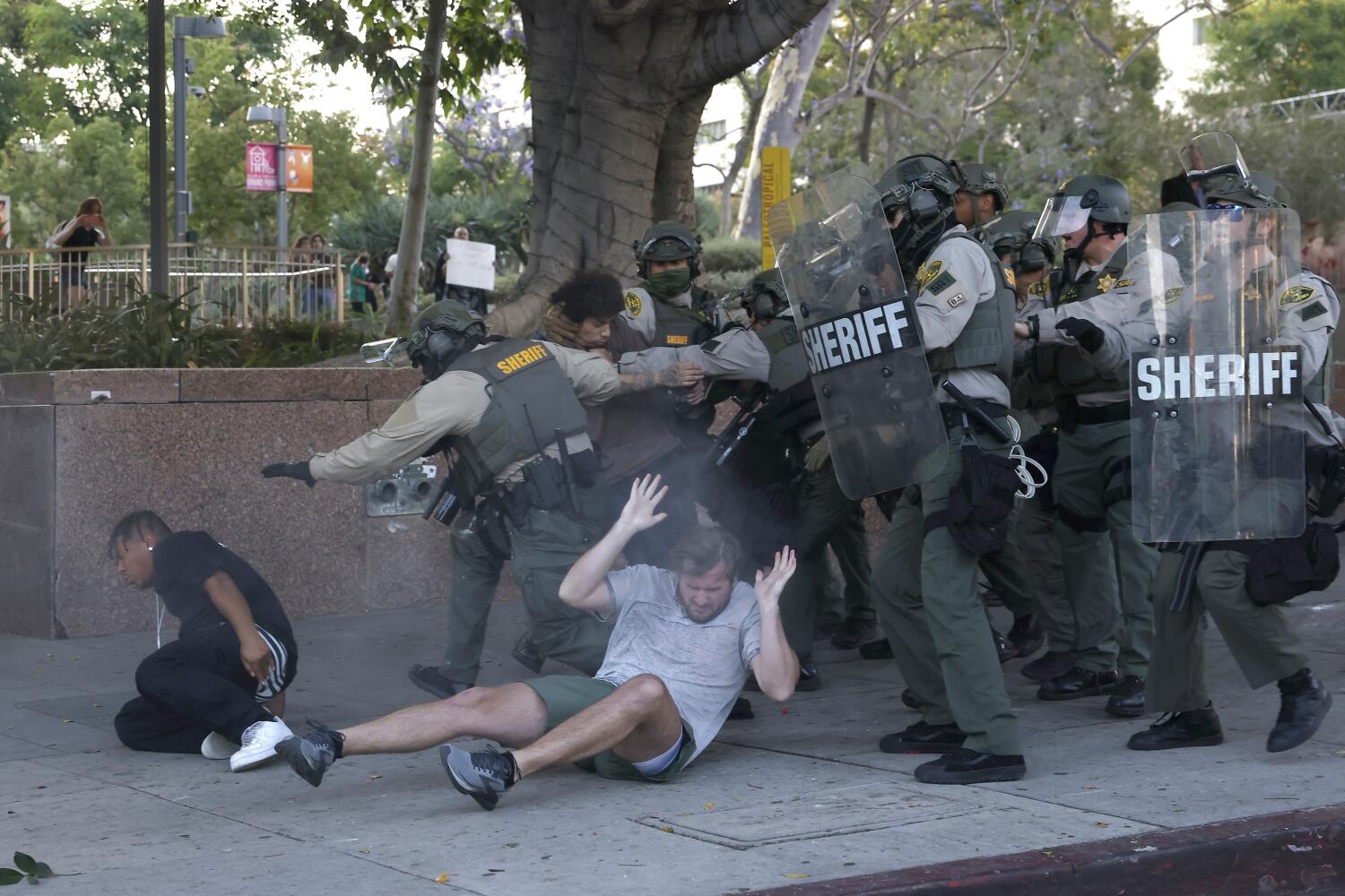 Los Angeles County Sheriff deputies kettle and arrest protesters in Grand Park
