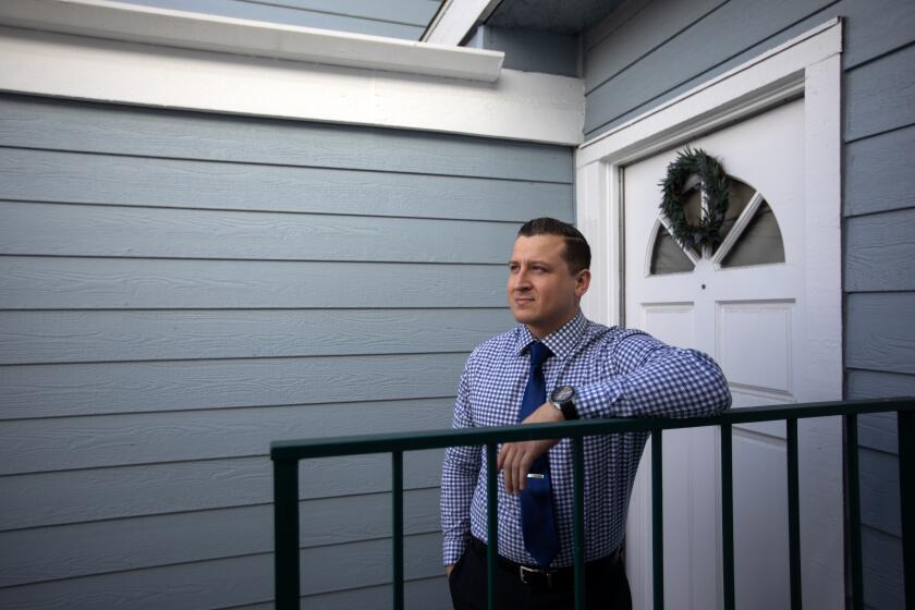 Sylmar, CA - November 13, 2023: Portrait of Nicholas Uribe at his home in Sylmar, CA November 13, 2023. He would like to trade up and buy a bigger place, but can't afford anything because home prices are rising at the same time as interest rates. (Francine Orr/ Los Angeles Times)