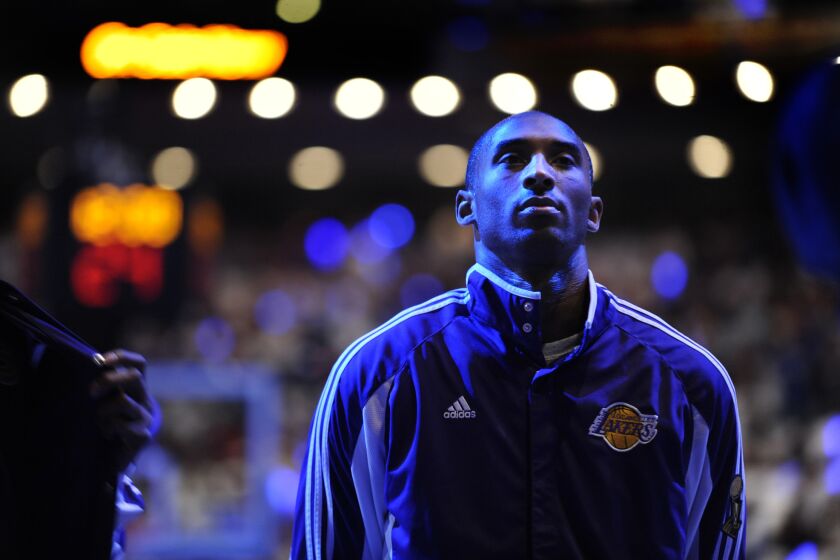 ORLANDO, FLORIDA JUNE 11, 2009--Lakers Kobe Bryant listens to the National Anthem before Game 3 of the NBA Finals in Orlando Thursday.