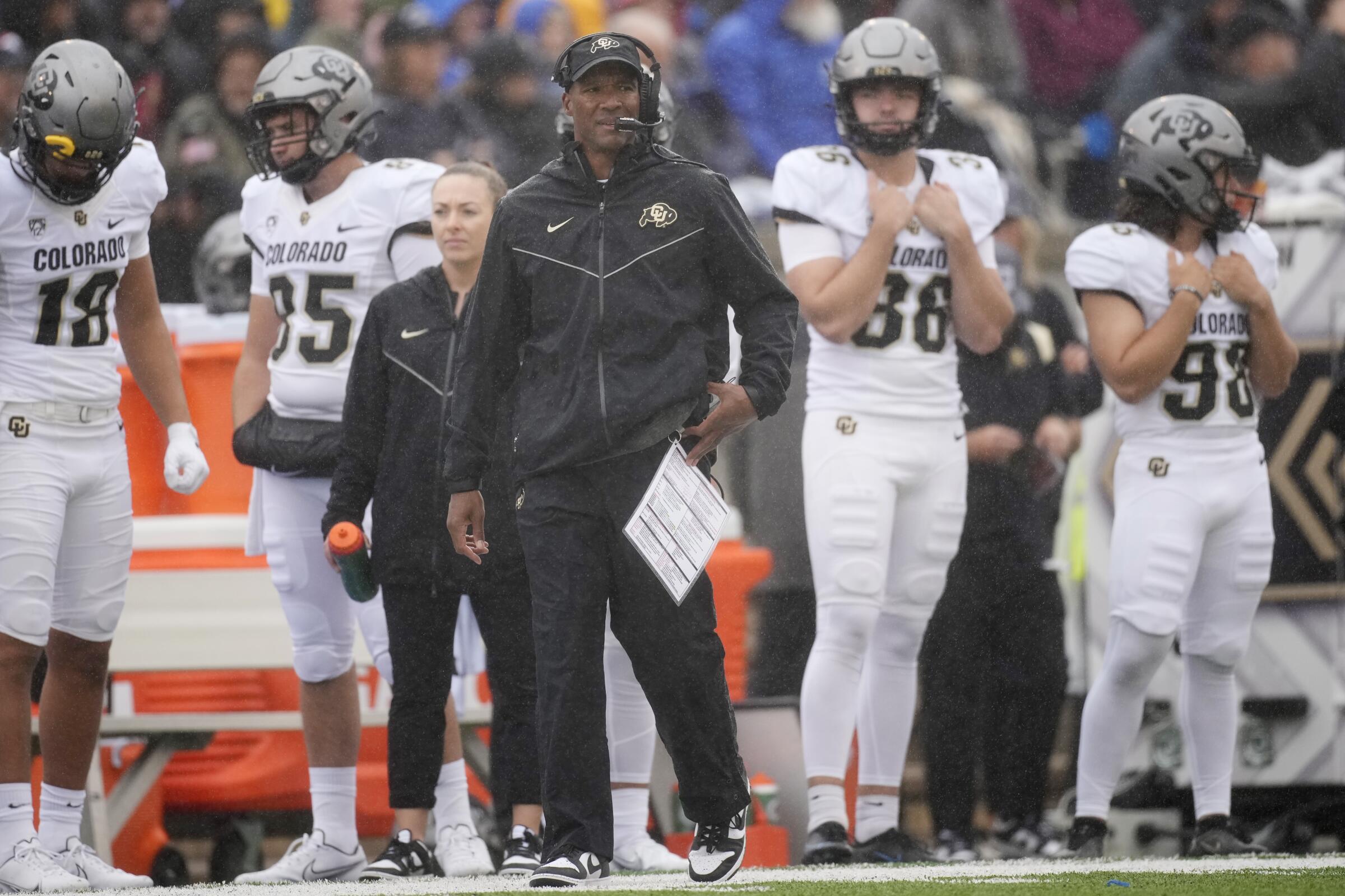 Colorado head coach Karl Dorrell stands on the sideline