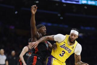 Los Angeles, CA - January 03: Lakers Anthony Davis drives for position vs Miami Heat Bam Adebayo.
