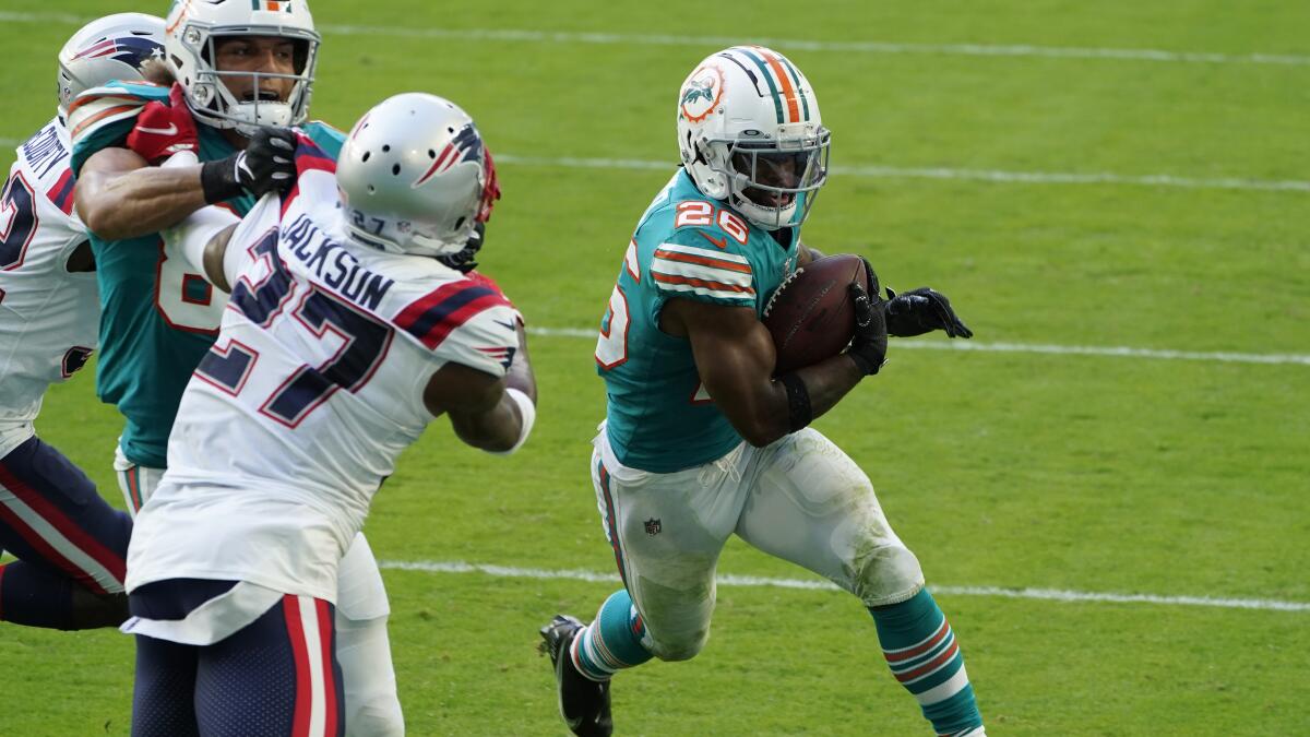 Who deserves the game ball after the Dolphins 27-20 victory over