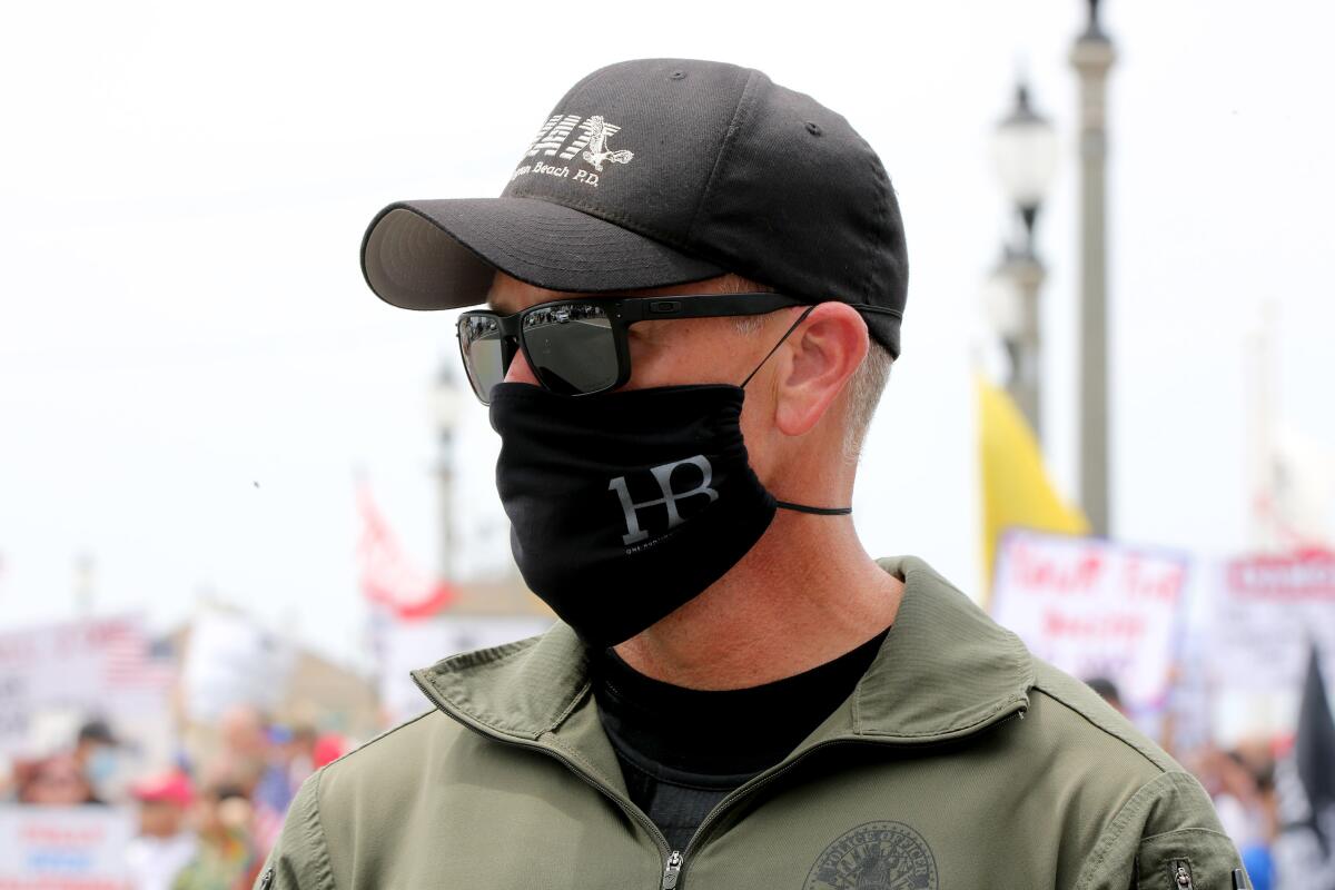 Huntington Beach SWAT member wears a face mask in Huntington Beach in May.