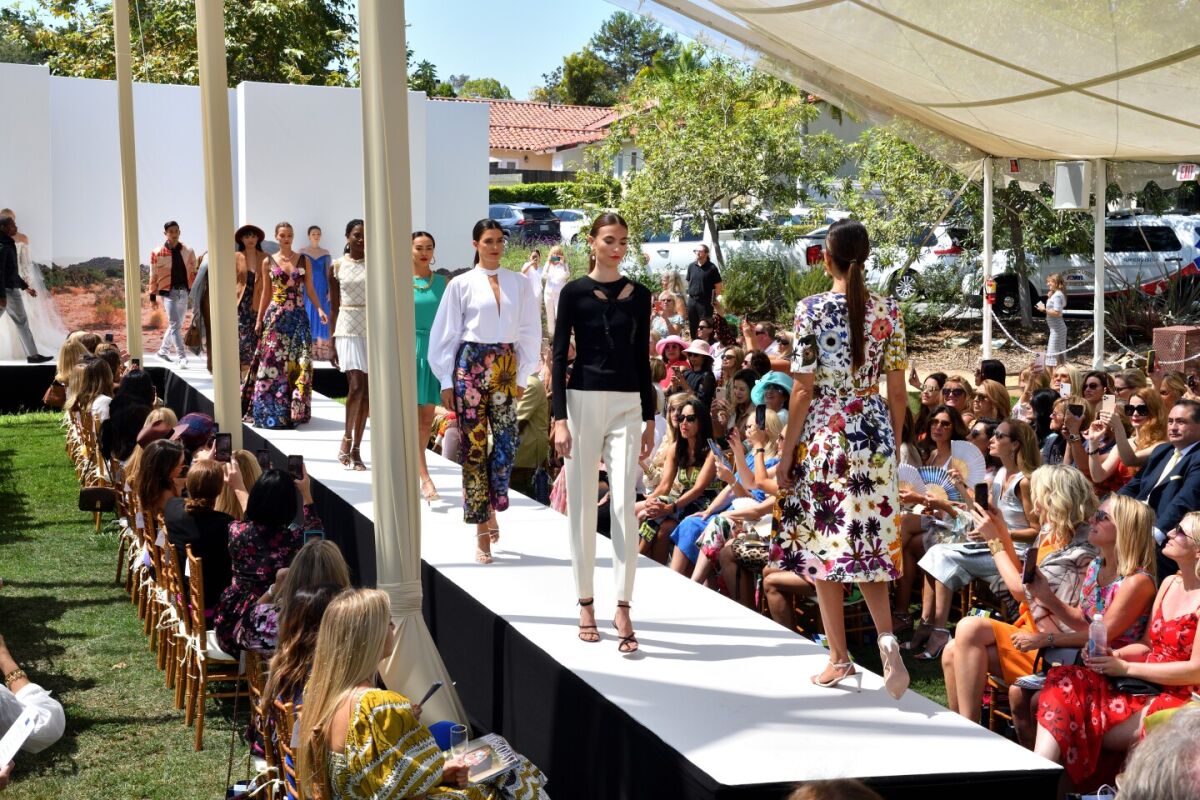 Models on the runway at the 2019 Art of Fashion show.